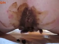 Pretty girl fingering her tiny ass hole until a poop comes out